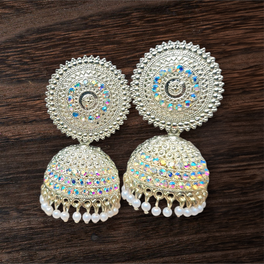 Bell-shaped jhumka adorned with shimmering stones ✨