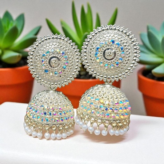 Bell-shaped jhumka adorned with shimmering stones ✨